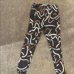 Sweaty Betty Black and Brown Leggings with Artistic Design